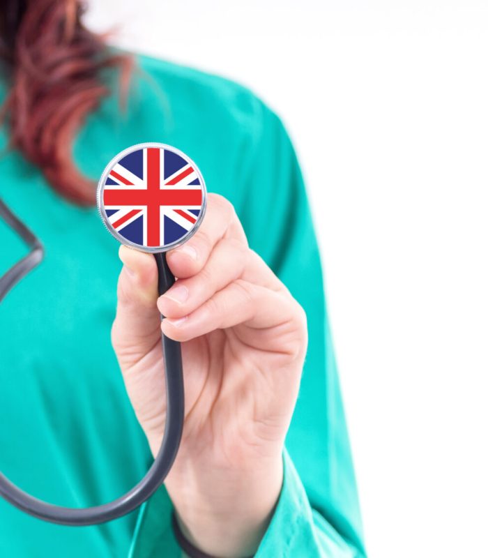 United Kingdom national healthcare system female doctor with stethoscope